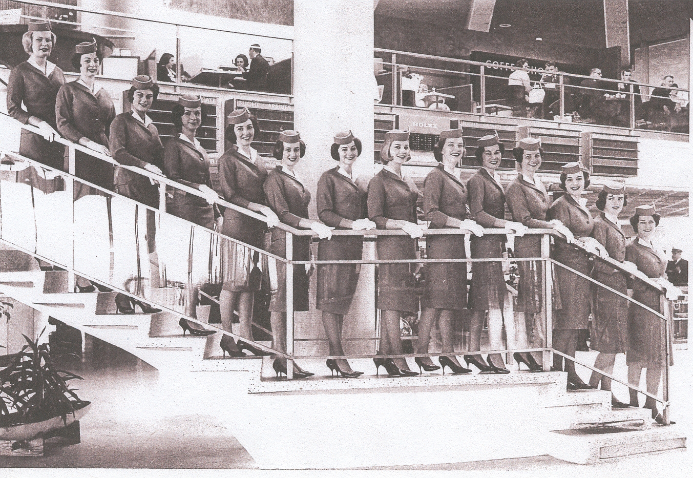 1963 Lynn Van Hoof-Werner, second from left, and colleagues pose for  the class Graduation photo  inside the Pan Am WorldPort passenger terminal at New York, Idlewild  Airport..
